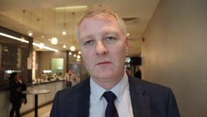 Sinn Fein's Martin Kenny reacts to his official tallies