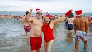 Hundreds brave the cold to make a splash for charity