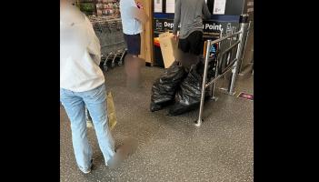 People divided over man at Deposit Return machine with two big black bags of bottles