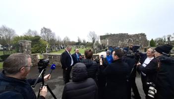 Family pray beside Liam Farrell&rsquo;s exhumed body before he