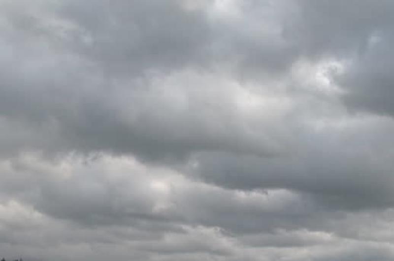 Cloudy with scattered outbreaks of rain