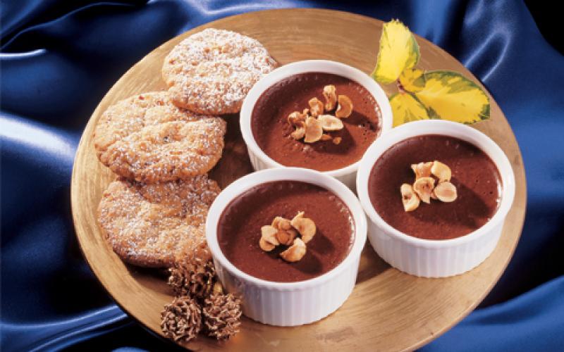 Decadent chocolate pots with nutty biscuits