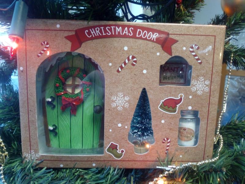 DAY 7:  Win a Christmas elf door set!