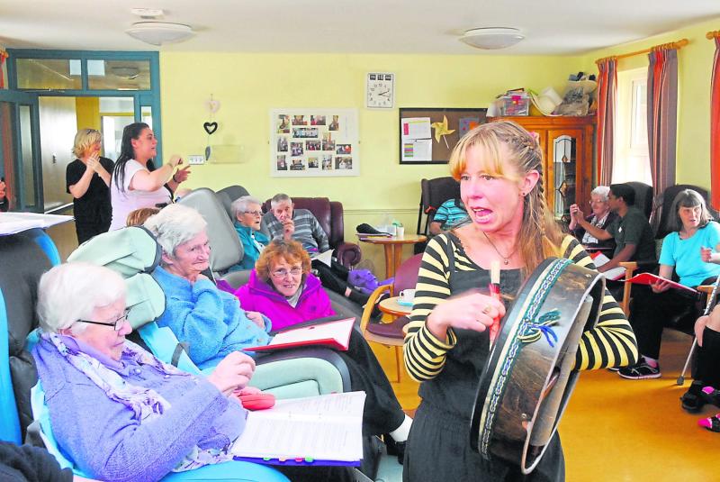 Residents “shake, rattle and roll” with music therapy