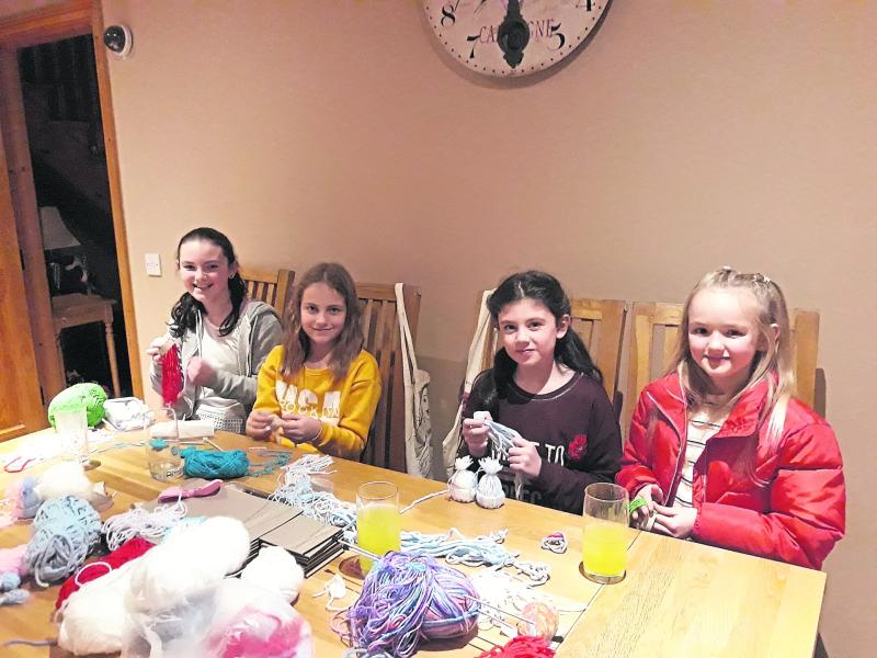 Kate and Rachel win Christmas badges for everyone at their school!