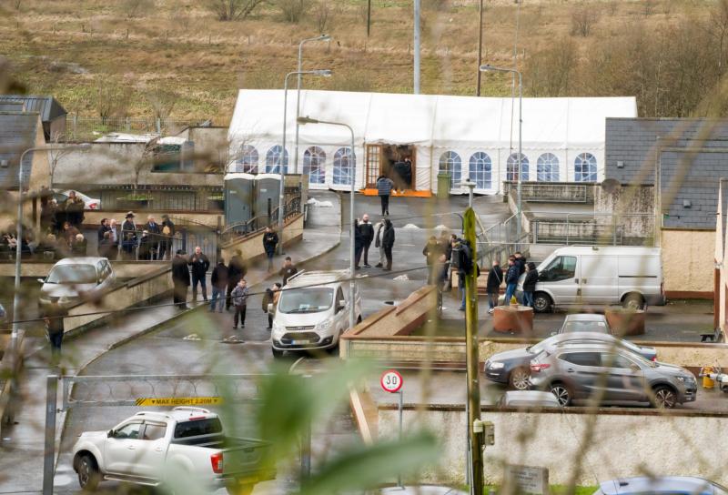 Large crowd pictured in marquee erected for Traveller mourners