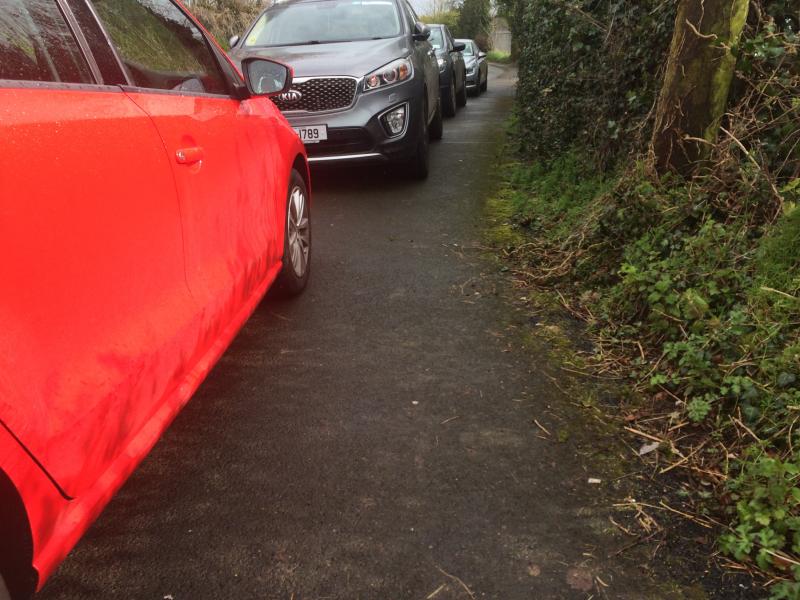 Dolan said there "wasn't a chance of a vehicle getting through with cars parked up on both sides of the road"
