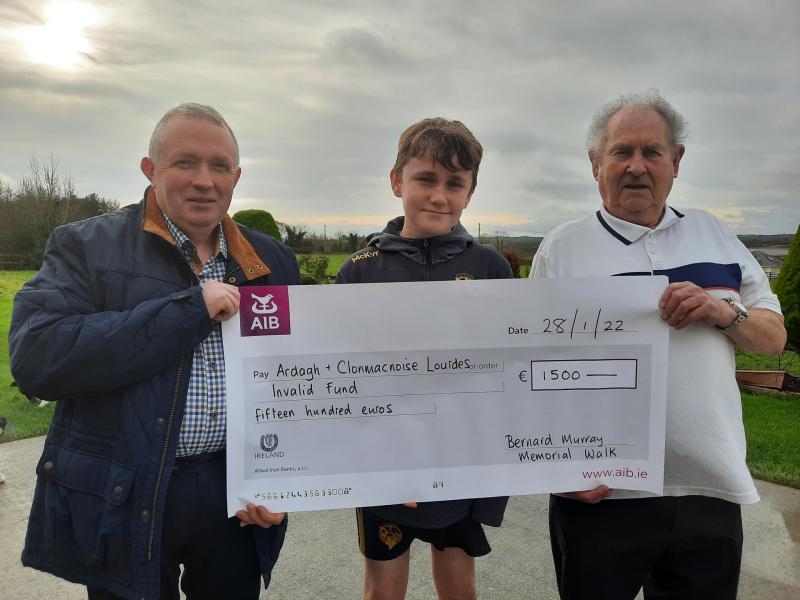 Bernard Murray Walk sees cheques presented to two charities