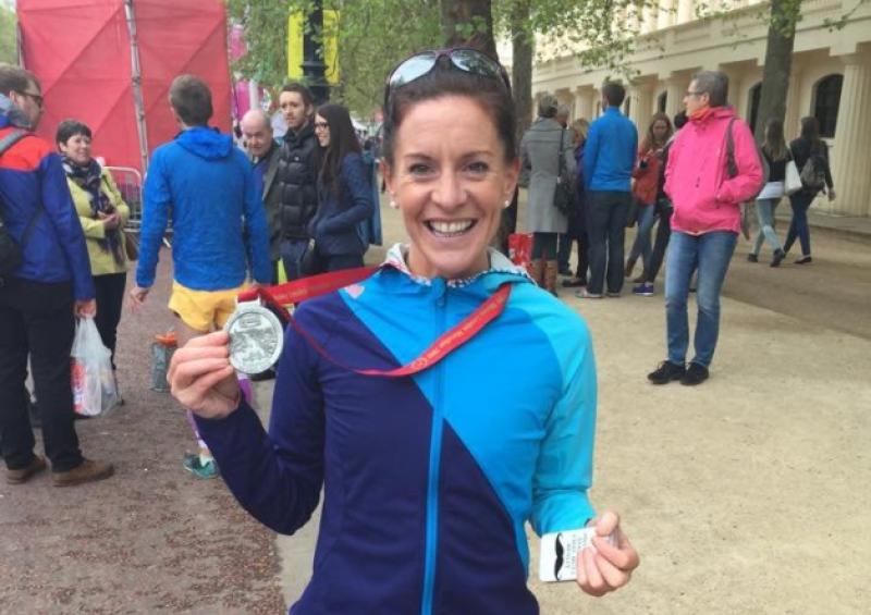 A delighted Breege Connolly pictured with her finisher's medal after last Sunday's Virgin London Marathon - the Kinlough native finished inside the qualifying time for the 2016 Olympic Games.