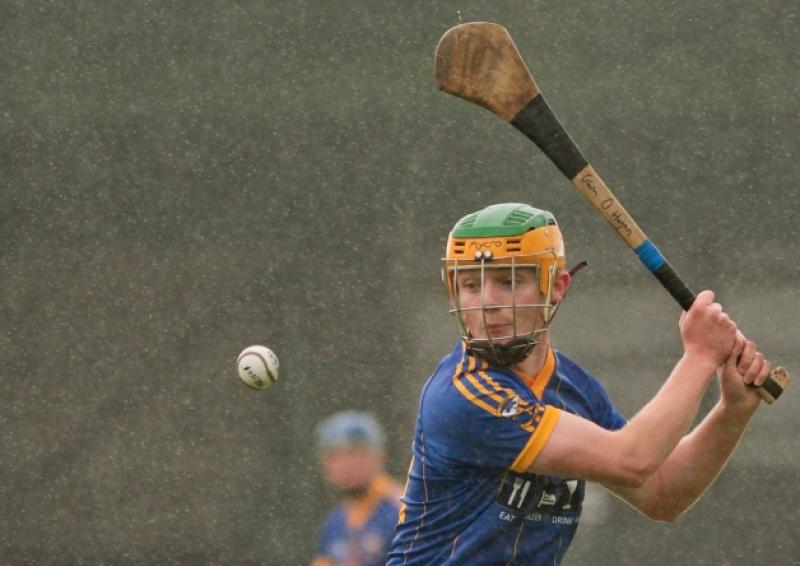 A fantastic shot of Gavin O'Hagan striking the sliothar in the rain during Monday's AIB Connacht Club Junior Championship Semi-Final. Photo by James Molloy