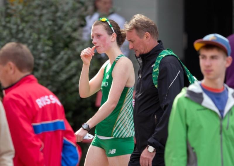 Laura Reynolds, accompanied by National Endurance Coach Chris Jones, after having to drop out of the Women's 20K Race Walk at the European Championships in Zurich last Thursday. Photo by Morgan Treach/INPHO