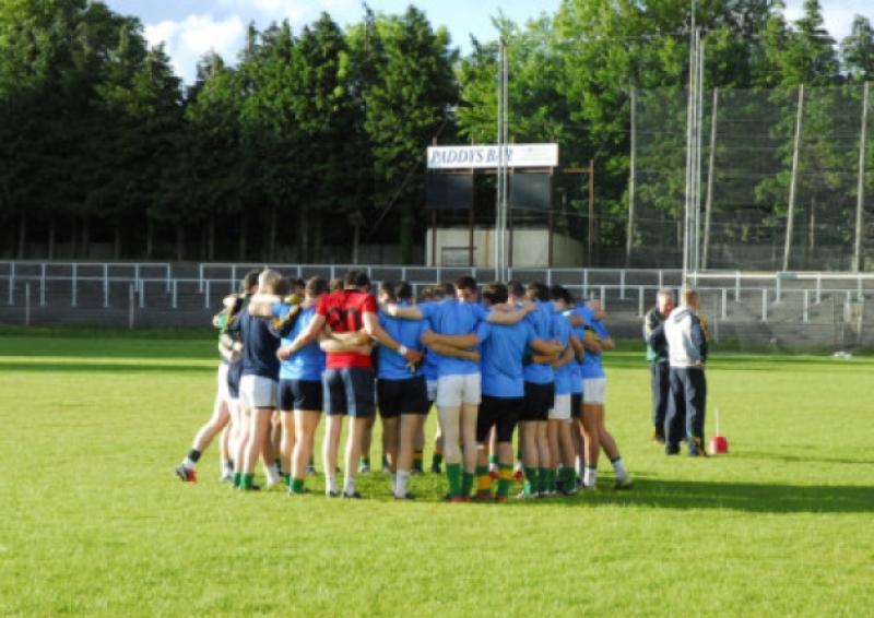 The Leitrim team are pictured in a huddle during training last week in Pairc Sean MacDiarmada.
