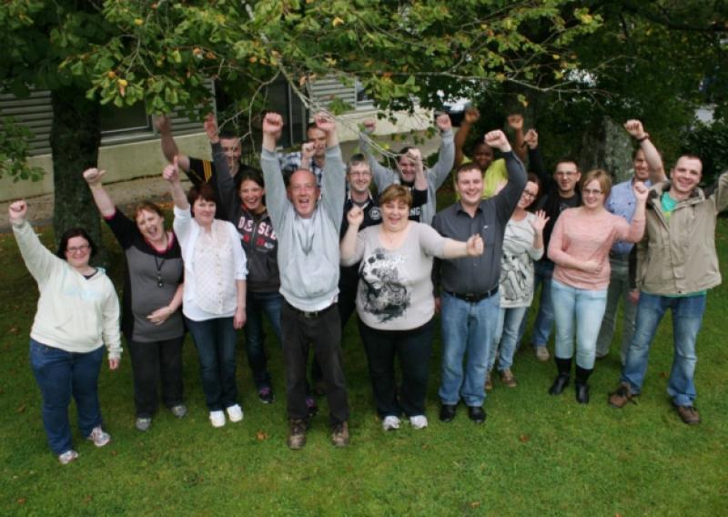 Lotto winers in Rooskey. Alan Hogan (centre) who bought the ticket for the Vistamed syndicate is pictured with some of the winning staff at the Roosey plant. Photo Brian Farrell