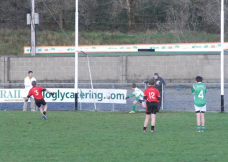 Fenagh's Oisin McLoughlin dispatches a last minute penalty to send last Friday's U-14 League 15-a-side Final in Ballinamore to extra-time which Mohill eventually won. Photo by Willie Donnellan