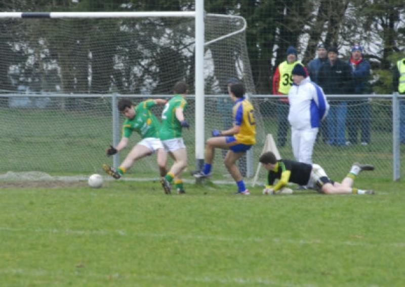 Roscommon's Donie Smith slides the ball past a despairing Leitrim net into the net during last Saturday's Cadbury's Connacht U-21 Championship Semi-Final in Kiltoom. Photo by Willie Donnellan