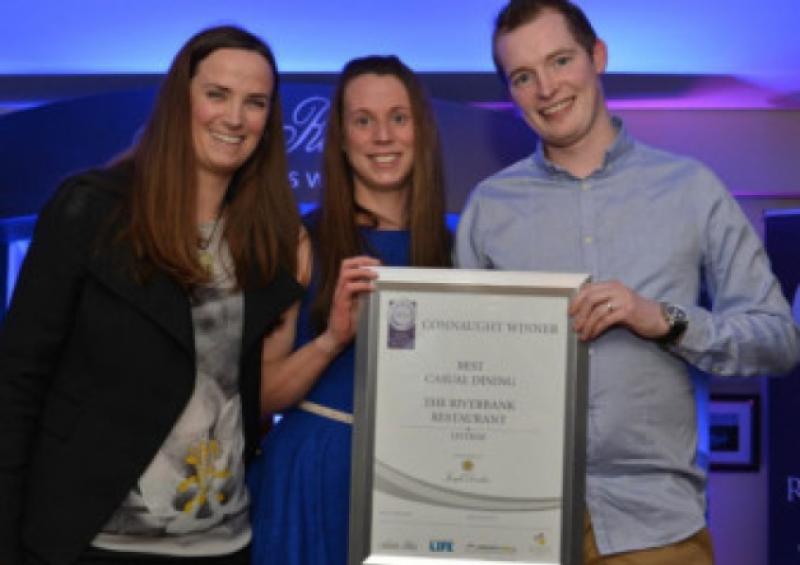 Maud Condomine of Gleesons incorporating Gibeys presents the award for Best Casual Dining  in Leitrim to Ruth & John Kelly of The Riverbank Restaurant, Dromahair.