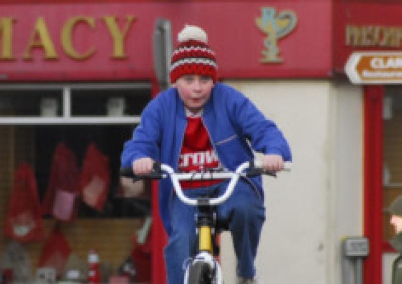 David Rawle cycles through Boyle during filming for Moone Boy Series One in January this year.Photo by Willie Donnellan