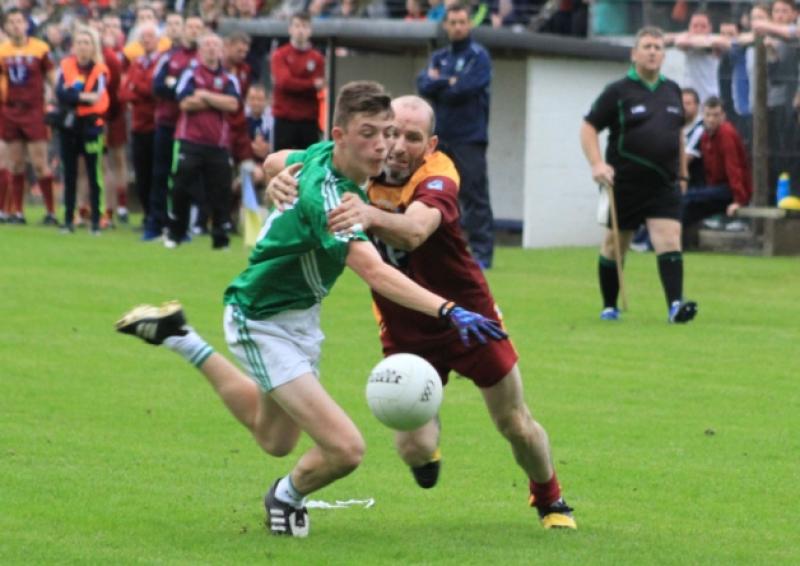 Mohill's Ronan Cox wrestles with Annaduff's Nigel Cox for the ball during last Saturday's Connacht Gold Senior Championship Quarter-Final in Cloone. Photo by Therese Foy