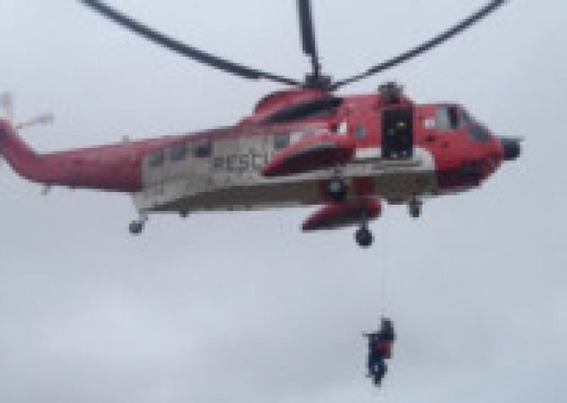 A 53 year old woman was rescued from an abandoned mine shaft after she fell while hiking with friends on Sunday.