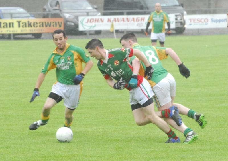 Kiltubrid's tries to get to the ball ahead of Drumreilly's James Holohan.