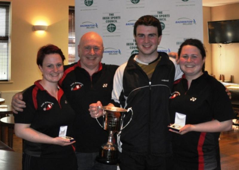 All-Ireland badminton medal winners Clare, John & Therese Finnegan from Carrigallen pictured with the Cup won by Sligo Badminton Club and their father Michael.