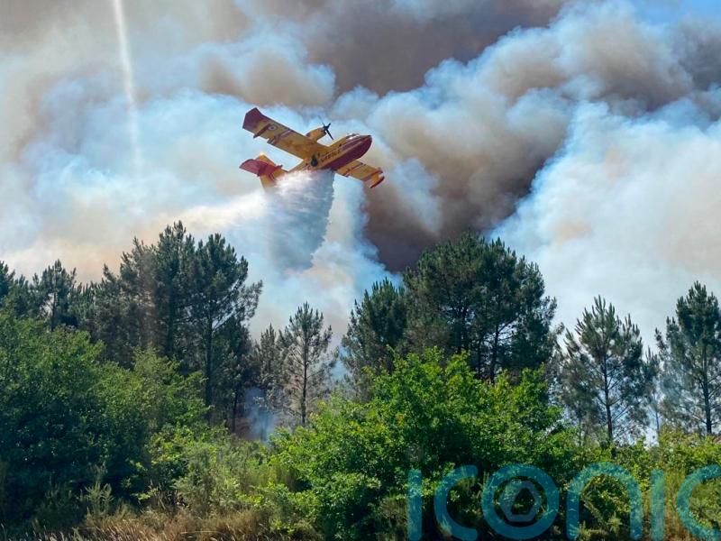 Wildfires scorch France and Spain as heatwave-related deaths soar across Europe