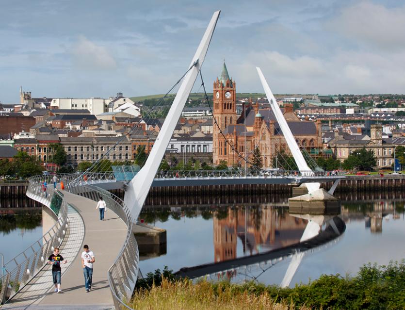 Peace Bridge on the River Foyle with the Guildhall in the background