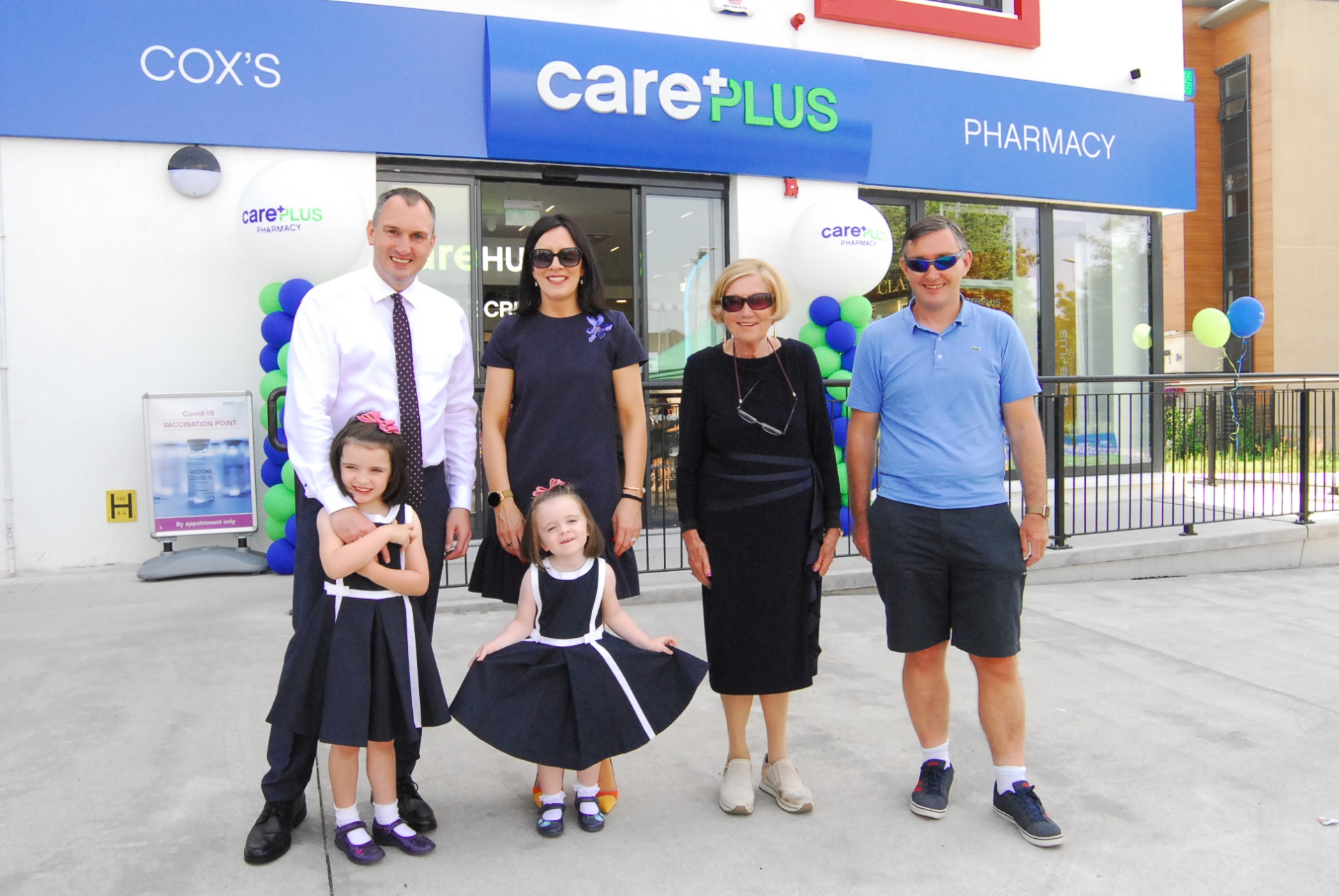 RIGHT: Fintan Cox with his daughter Isabelle at the new CarePlus store
